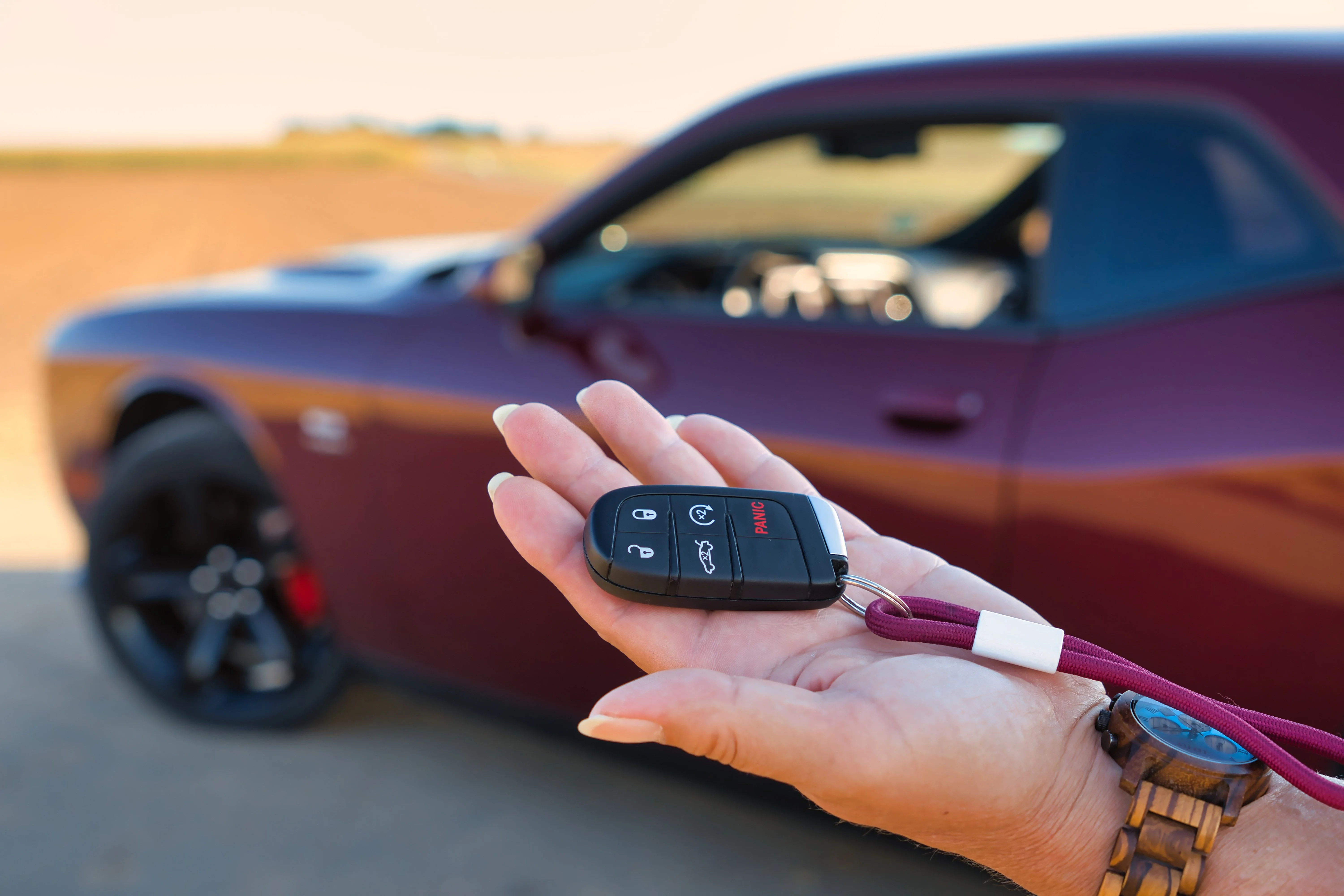 Heatwave Locksmith programming a car key in a Phoenix parking lot
